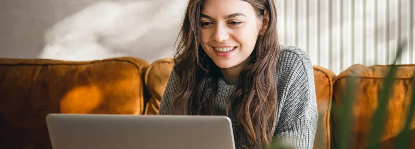 attractive-young-woman-working-laptop-early-morning